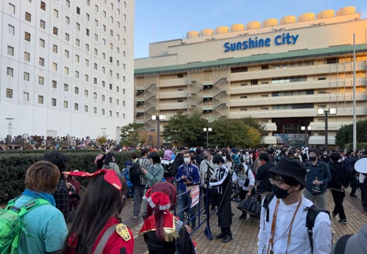 Crowds gather outside Sunshine City building during Ikebukuro Halloween Cosplay Festival in Tokyo