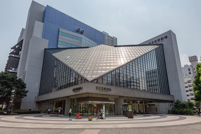 Glass-roofed facade and plaza of the Tokyo Metropolitan Theatre in Ikebukuro