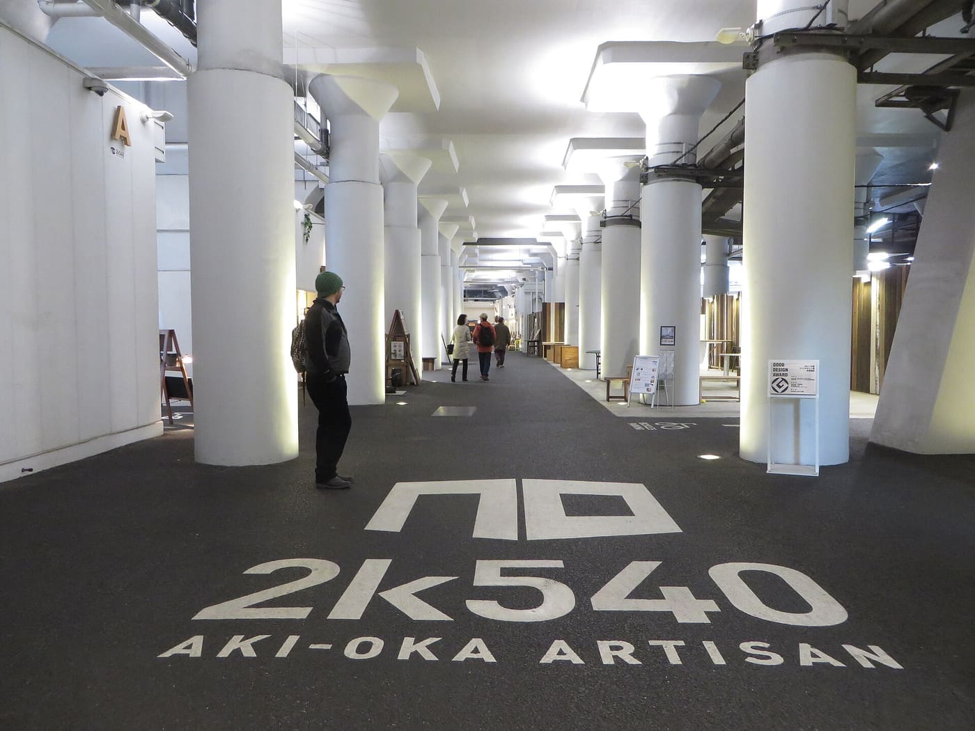 The white-pillared 2k540 Aki-Oka Artisan craft arcade under the tracks near Akihabara