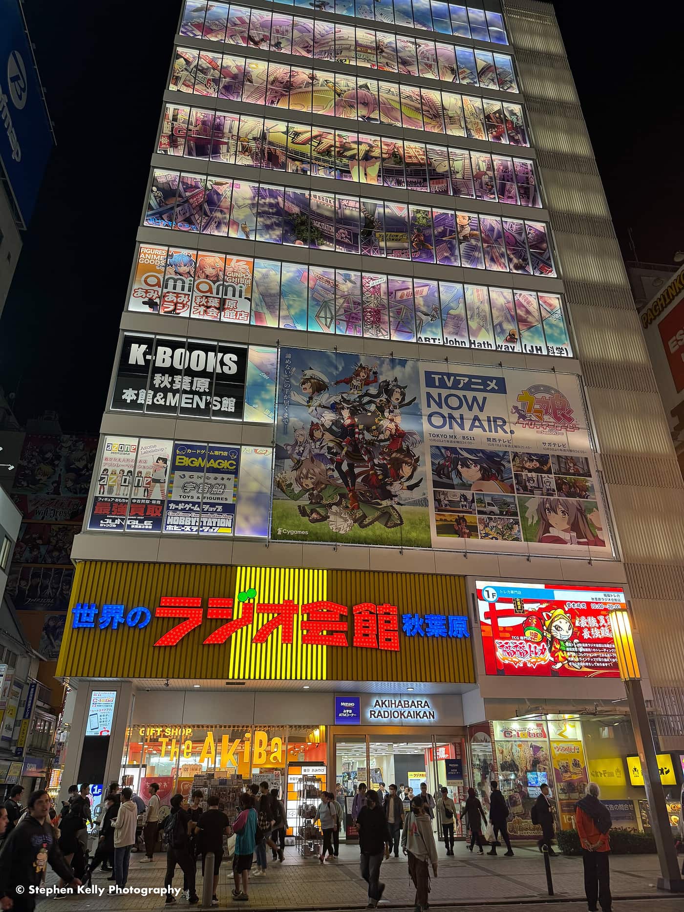 The rebuilt Akihabara Radio Kaikan hobby building with its anime murals opposite the station