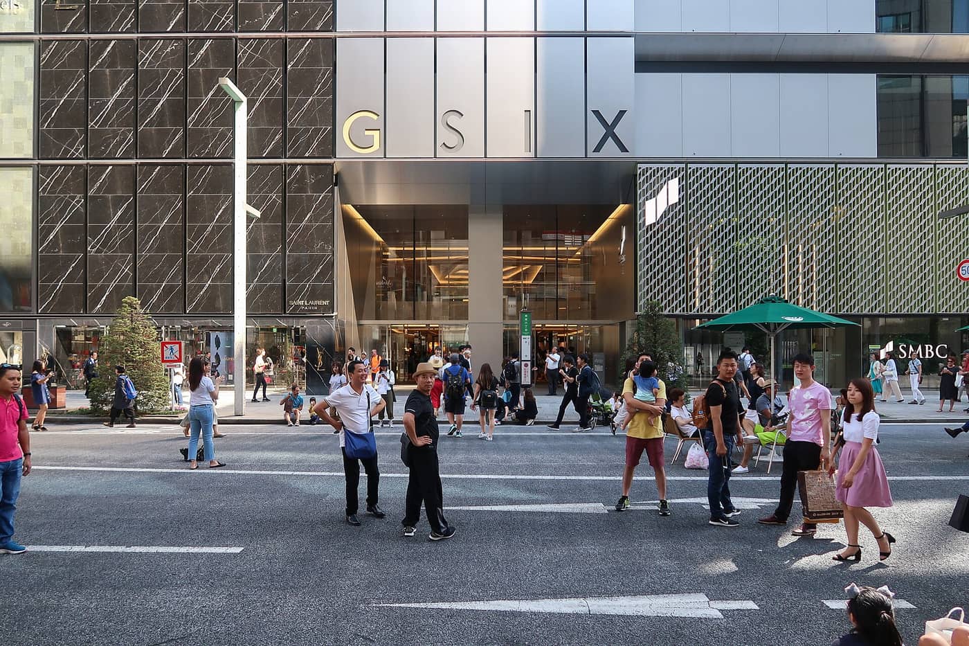 Crowds outside the main entrance of Ginza Six on Chuo-dori in Ginza