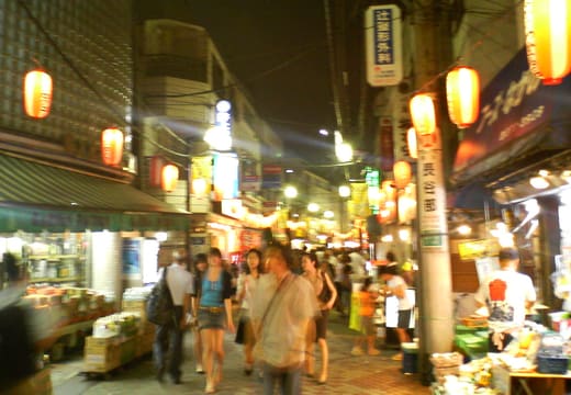 Paper lanterns and evening crowds along the Rokugo-dori shopping street north of Hatagaya Station