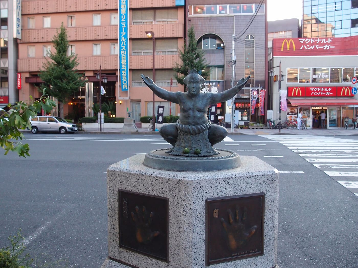 Bronze sumo wrestler statue on a Ryogoku street corner near the station