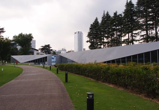 Folded steel roof of 21_21 Design Sight seen along the path through the Tokyo Midtown garden