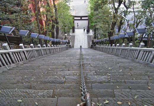 Looking down the steep Otoko-zaka stone stairway of Atago Shrine with its central handrail