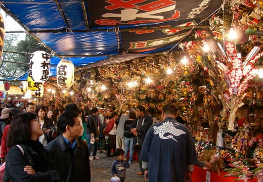 Crowds under lanterns at the November Tori-no-Ichi fair held at Hanazono Shrine, Shinjuku