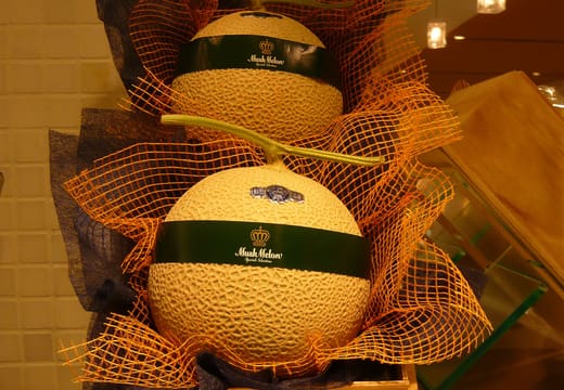 Gift-boxed luxury muskmelon priced for presentation in the Isetan Shinjuku food hall