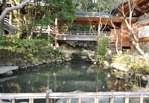Spring-fed pond and wooden buildings in the grounds of Jindaiji temple, Chofu