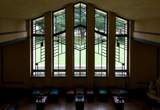 Frank Lloyd Wright's geometric window wall in the dining hall of Jiyu Gakuen Myonichikan