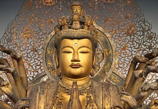 Gilded seated thousand-armed Kannon statue on display at the Tokyo National Museum