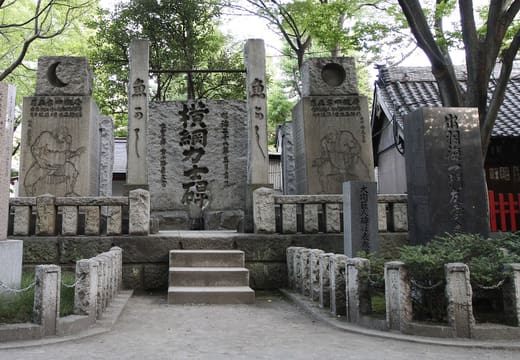 Yokozuna Stone carved with the names of sumo grand champions at Tomioka Hachimangu