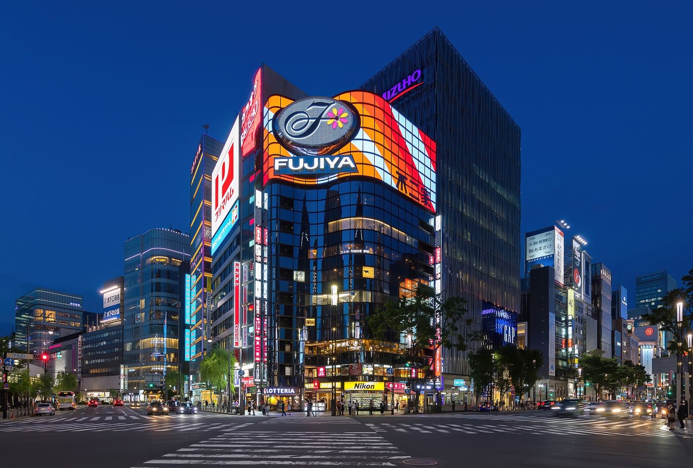 A lit Ginza street corner and the Fujiya building at blue hour, Chuo-ku