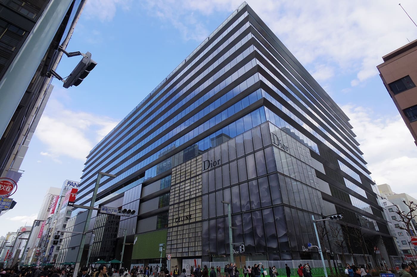 The layered glass facade of the Ginza Six shopping complex on Chuo-dori in Ginza