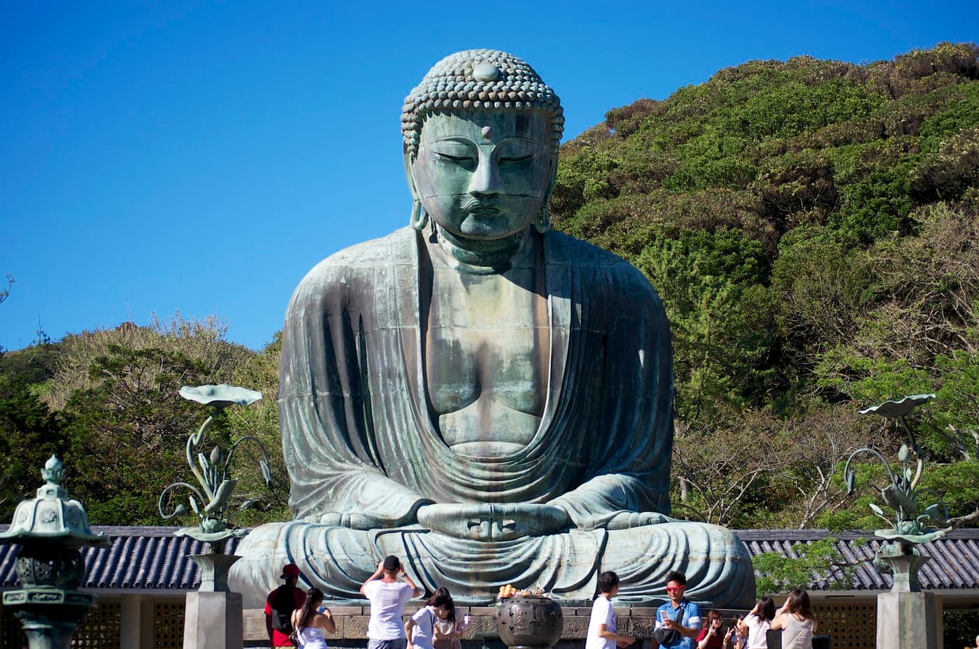 The bronze Great Buddha of Kotoku-in in Kamakura under a clear blue sky