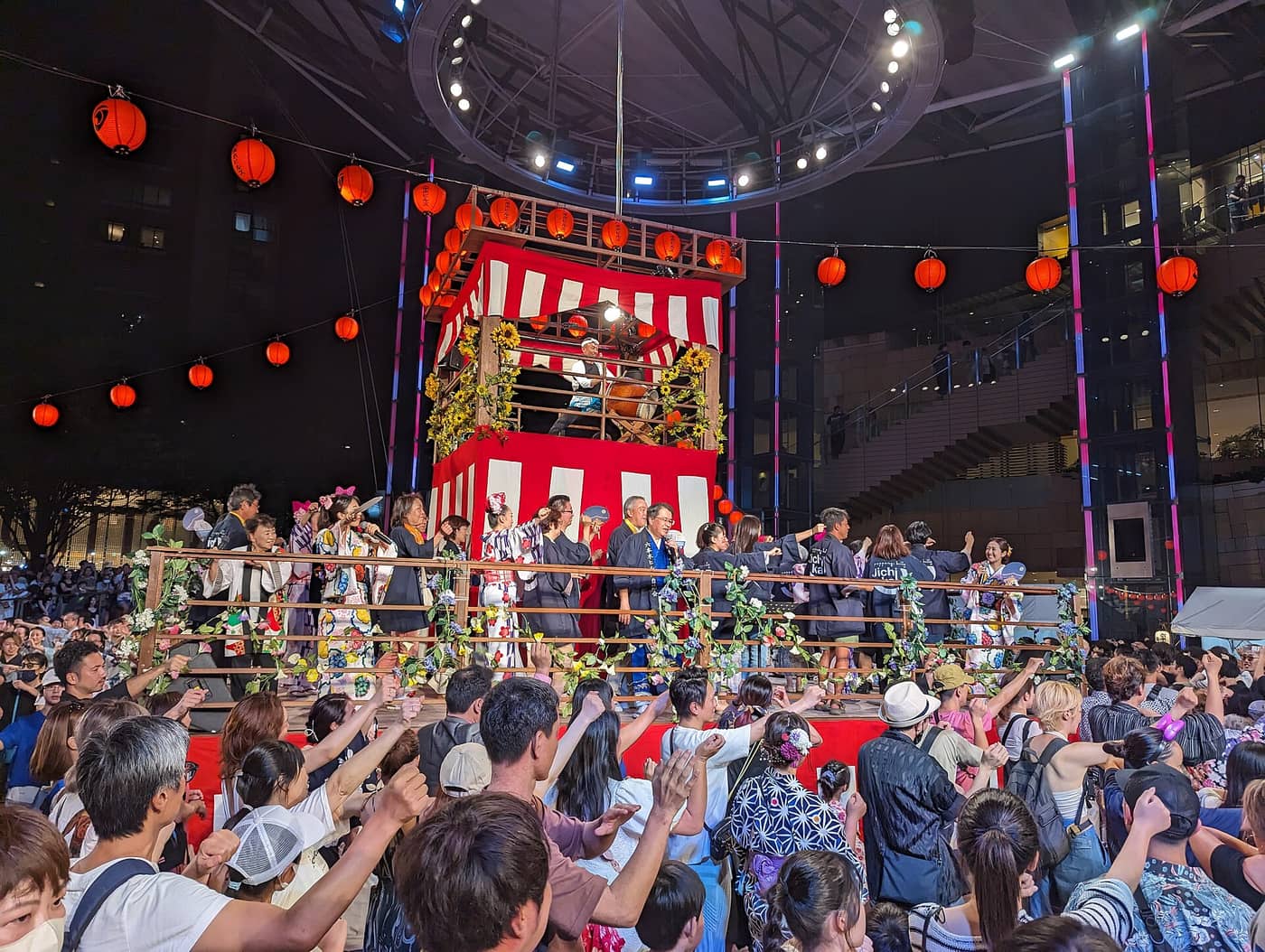 Crowds dancing around the lantern-hung yagura at the Roppongi Hills Bon Odori