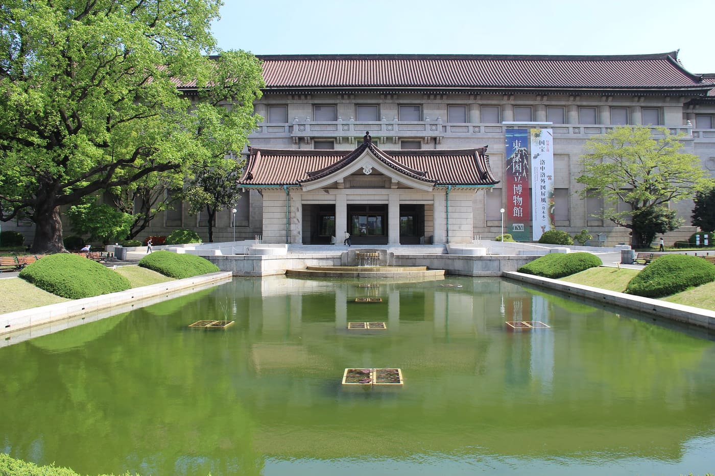 The Honkan of the Tokyo National Museum reflected in its front pond, Ueno