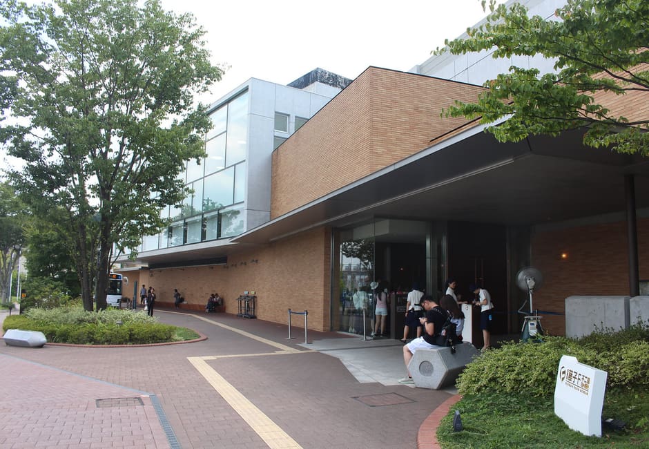 The brick and glass entrance of the Fujiko F. Fujio Museum in Kawasaki's Tama ward